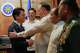 Philippine Defense Secretary Gilbert Teodoro Jr. greets his counterpart Japan's Shinjiro Koizumi, left, at the Malacanang presidential palace in Manila, Philippines on Tuesday, May 5, 2026.