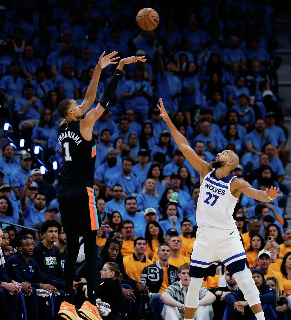 San Antonio Spurs forward Victor Wembanyama (1) shoots over Minnesota Timberwolves center Rudy Gobert (27) during the first half of Game 1 of the Western Conference semifinals at Frost Bank Center in San Antonio, Monday, May 4, 2026.