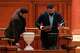 Staff members check the voting urns ahead of a no confidence vote against Prime Minister Ilie Bolojan's government in Bucharest, Romania, Tuesday, May 5, 2026.
