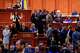 Romanian Prime Minister Ilie Bolojan, centre row third from right, sits as lawmakers vote during a no confidence vote in Bucharest, Romania, Tuesday, May 5, 2026.