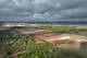 Construction is seen north of the Tesla Giga Texas factory in Austin on Wednesday, March 25, 2026. Elon Musk said he would build an advanced technology fabrication plant in Austin as he looks for a larger site to build his "Terafab" chip manufacturing plant that would eventually produce enough chips for 1 trillion watts, or 1 terawatt, of compute each year.