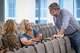 Erath County residents from left, Paige Castleberry and Vanessa Halford speak with Randall Terrell at a State Office of Administrative Hearings proceeding on Oncor’s proposed Dinosaur-Longshore 765kv transmission line at the Downtown Austin Marriott, Monday, May 4, 2026.