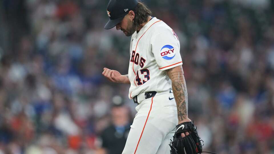 Houston Astros starting pitcher Lance McCullers Jr. (43) looks at his fingernails after a pitch during the third inning of an MLB baseball game on Wednesday, May 6, 2026. McCullers visited with trainers, but stayed in the game.