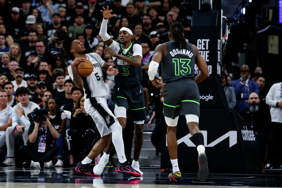 San Antonio Spurs guard Stephon Castle (5) holds onto the ball during the first half of Game 2 of the Western Conference semifinals at Frost Bank Center in San Antonio, Wednesday, May 6, 2026.