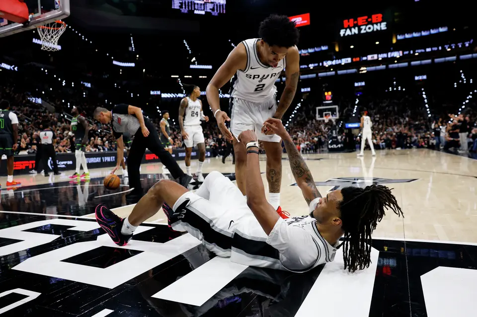 San Antonio Spurs guard Dylan Harper (2) helps guard Stephon Castle (5) up during the second half of Game 2 of the Western Conference semifinals at Frost Bank Center in San Antonio, Wednesday, May 6, 2026. The Spurs rolled past the Timberwolves 133-95 to even the series at 1-1.