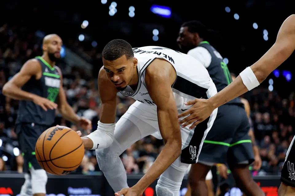 San Antonio Spurs forward Victor Wembanyama (1) scrambles for the ball during the second half of Game 2 of the Western Conference semifinals at Frost Bank Center in San Antonio, Wednesday, May 6, 2026. The Spurs rolled past the Timberwolves 133-95 to even the series at 1-1.