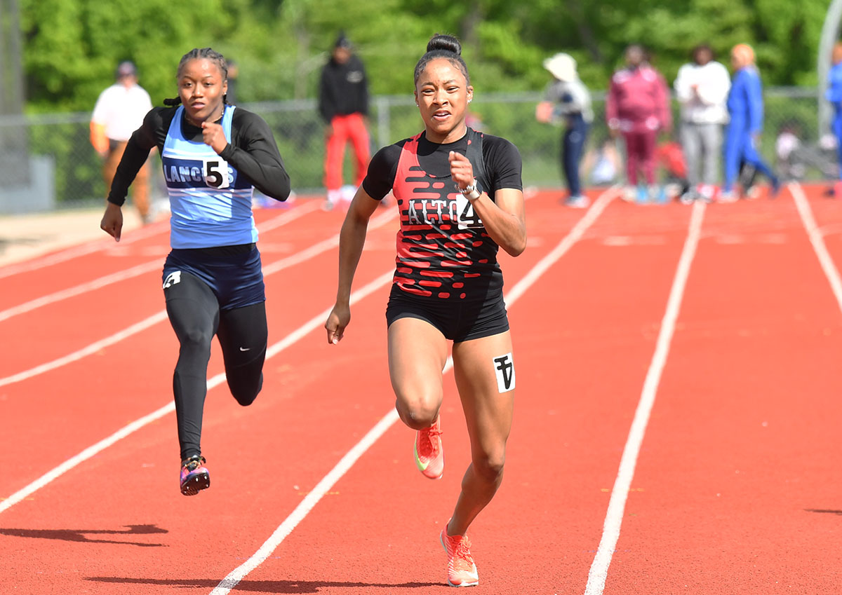 Alton's Rayna Raglin swept the 100, 200 and 400 meters, while Edwardsville turned in a dominant day...