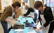 Participants work on printmaking during artist Bill Pangburn's workshop at the Art Museum of Southeast Texas, May 2.