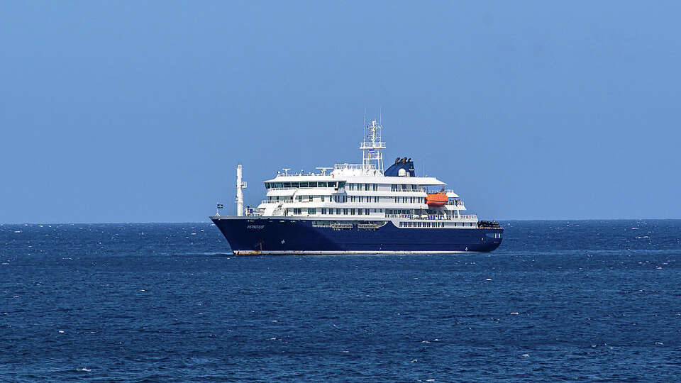 A general view of the cruise ship MV Hondius stationary off the port of Praia, the capital of Cape Verde, on May 3, 2026. An outbreak of 'severe acute respiratory illness' on board a cruise ship in the Atlantic has left two people dead and a third in intensive care in Johannesburg, South Africa's health ministry told AFP on May 3, 2025. The outbreak occurred on the MV Hondius, travelling from Ushuaia in Argentina to Cape Verde. The patient being treated in Johannesburg tested positive for a hantavirus, a family of viruses that can cause hemorrhagic fever, South African spokesperson Foster Mohale said. (Photo by AFP via Getty Images)