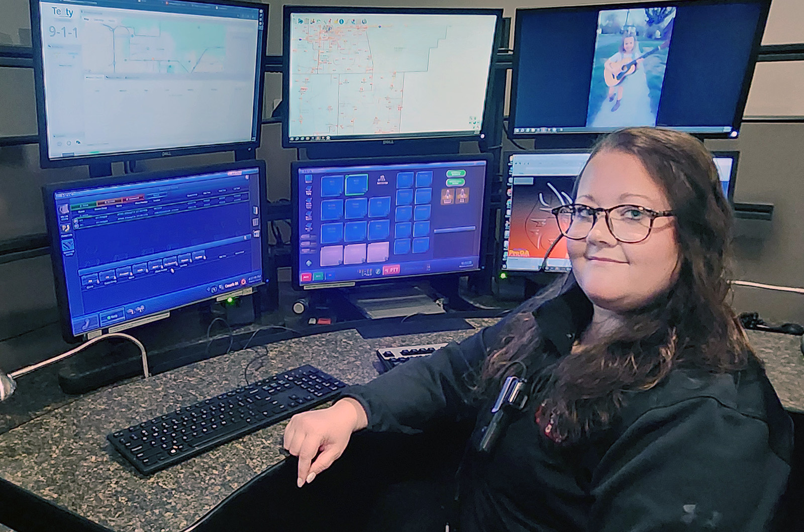 Behind the badge: Telecommunicator Taylor Stone-Lowe finds calling by stepping out of comfort zone