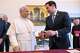 FILE - In this handout photo provided by Vatican Media, Pope Leo XIV exchanges gifts with U.S. Secretary of State Marco Rubio, right, as they meet in the pope's private library at the Vatican, Thursday, May 7, 2026. (Vatican Media via AP)