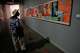 Iranian Artist Ghazaleh Jahanbin looks at "F-111" an artwork of American artist James Rosenquist as she visits an exhibition called: "Art & war" displaying some artworks of American pop artists at the Tehran Museum of Contemporary Art in Iran, Thursday, May 7, 2026.