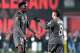 FILE - Real Madrid's Federico Valverde, right, celebrates with Aurelien Tchouameni after scoring his side's opening goal during the Spanish La Liga soccer match between Rayo Vallecano and Real Madrid at the Vallecas stadium in Madrid, Spain, Saturday, Dec. 14, 2024.