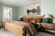 Square footage was added to give each bedroom an en suite bath.