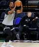 San Antonio Spurs associate coach Sean Sweeney, right, talks to a players as forward Harrison Barnes, left, participates in shootaround in preparation for Game 3 of the Western Conference semifinals against the Minnesota Timberwolves at Target Center in Minneapolis on Friday, May 8, 2026.