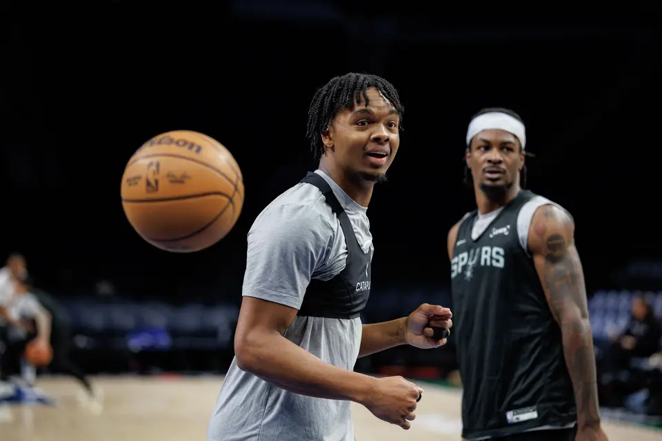 San Antonio Spurs forward Harrison Ingram, front, and forward Emanuel Miller participate in a shootaround before Game 3 of the Western Conference semifinals against the Minnesota Timberwolves at Target Center in Minneapolis on Friday, May 8, 2026.
