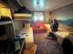 A passenger checks his camera in his cabin on the hantavirus-hit cruise ship MV Hondius during the voyage to the Spanish port of Tenerife, May 6, 2026.