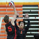 New Canaan's Nolan McLaughlin (5) spikes the ball as Shelton's Luke Park (1) looks to block during boys volleyball action in Shelton, Conn., on Friday May 8, 2026. Shelton defeated New Canaan, 3-2.