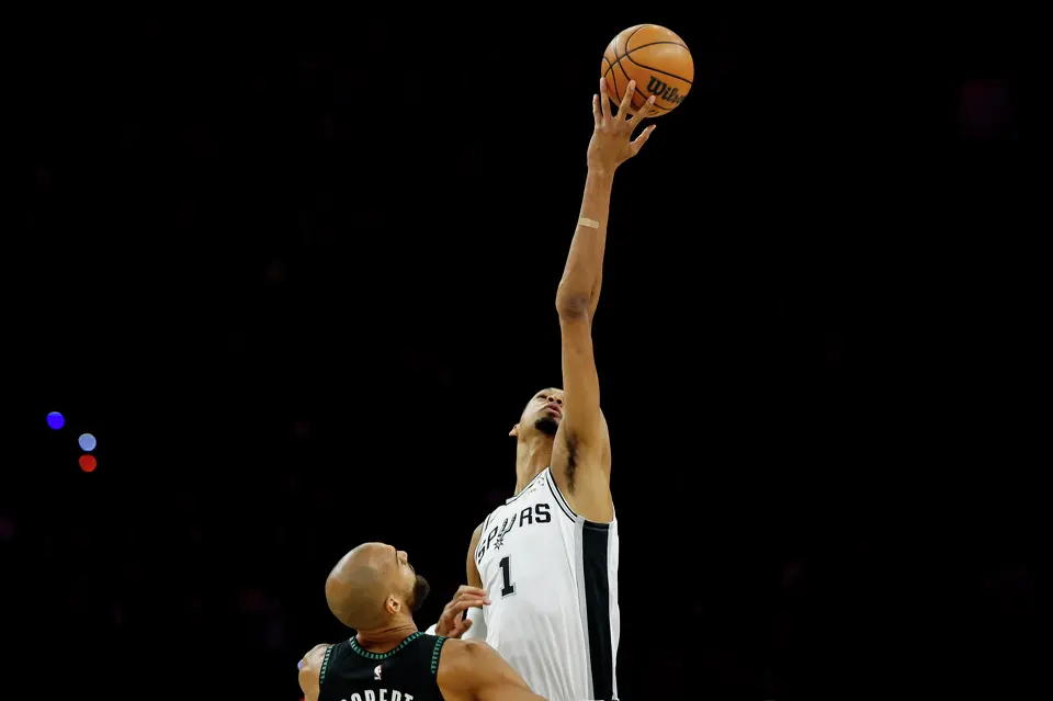 San Antonio Spurs forward Victor Wembanyama (1) wins the tip-off against Minnesota Timberwolves center Rudy Gobert (27) during the first half of Game 3 of the Western Conference semifinals at Target Center in Minneapolis, Friday, May 8, 2026.