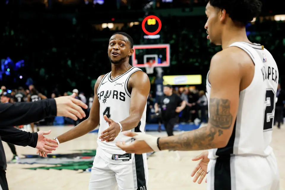 San Antonio Spurs guard De'aaron Fox (4) celebrates the Spurs’ win after Game 3 of the Western Conference semifinals at Target Center in Minneapolis, Friday, May 8, 2026. The Spurs defeated the Timberwolves 115-108, leading the series 2-1.