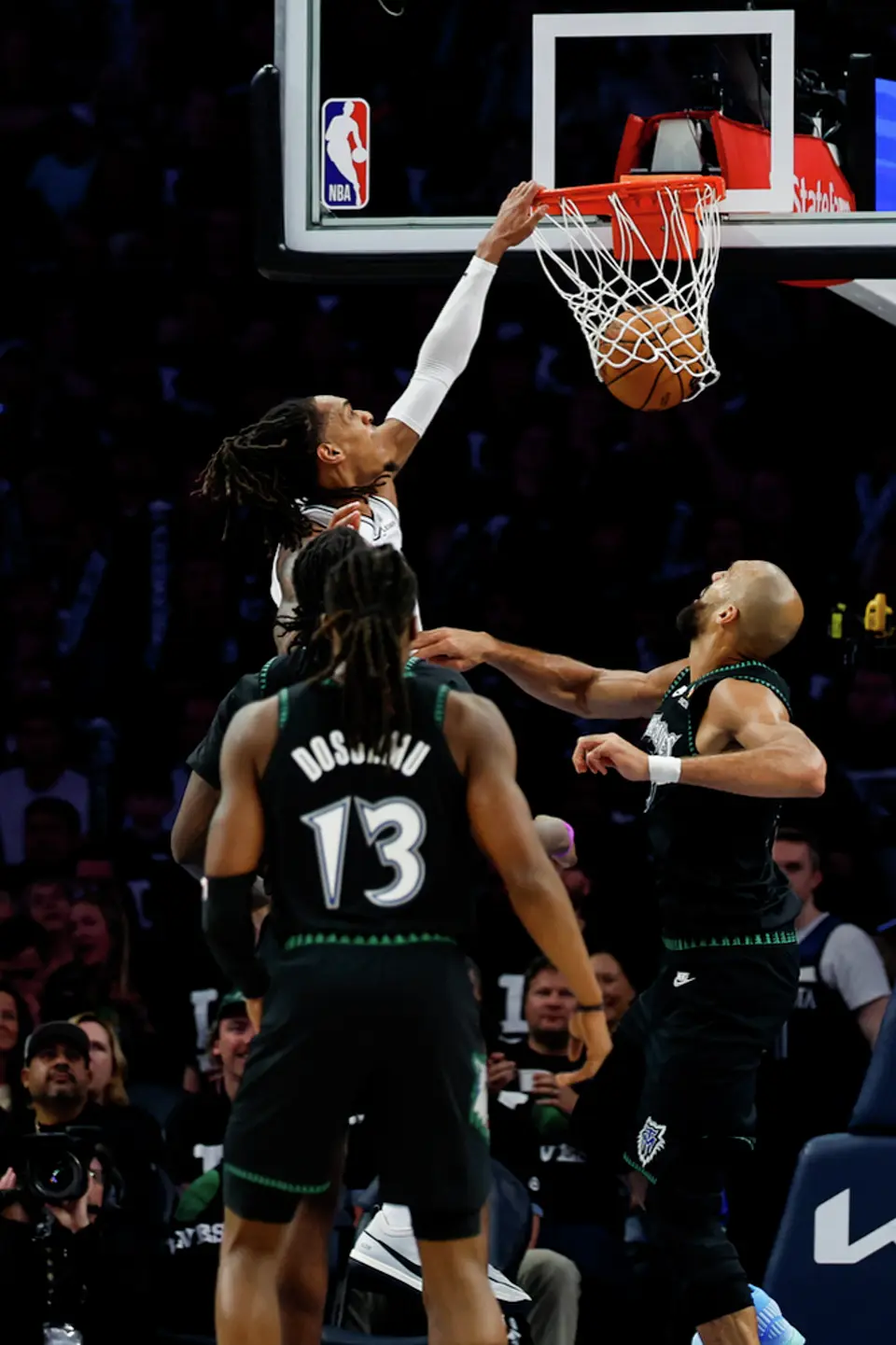 San Antonio Spurs guard Devin Vassell (24) dunks the ball during the second half of Game 3 of the Western Conference semifinals at Target Center in Minneapolis, Friday, May 8, 2026. The Spurs defeated the Timberwolves 115-108, leading the series 2-1.