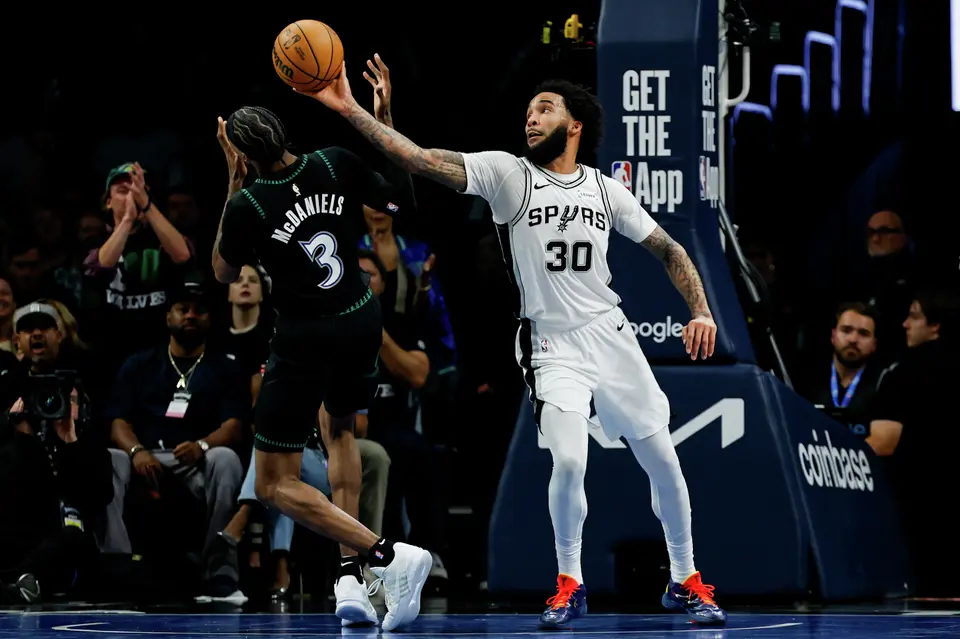 San Antonio Spurs forward Julian Champagnie (30) rebounds the ball during the second half of Game 3 of the Western Conference semifinals at Target Center in Minneapolis, Friday, May 8, 2026. The Spurs defeated the Timberwolves 115-108, leading the series 2-1.