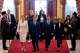 Hungarian Prime Minister-elect Peter Magyar, center, arrives with fellow lawmakers at the Parliament building in Budapest, Hungary, Saturday, May 9, 2026.