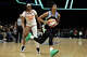 New York Liberty forward Aubrey Griffin (22) drives past Connecticut Sun forward Aneesah Morrow (24) during a WNBA basketball game in New York on Friday, May 8, 2026. (AP Photo/Adam Hunger)