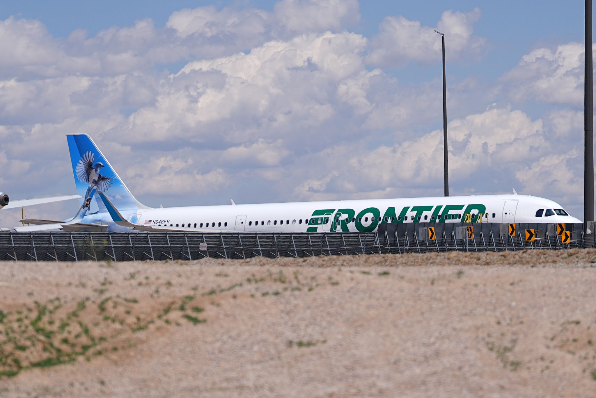 NTSB gathering details on Frontier Airlines evacuation after plane hit and ...