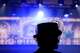 Lacey Lucas is silhouetted against the stage during the House of DIFFA gala in Dallas, Saturday, May 9, 2026.