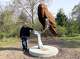 Big Rapids celebrated Migratory Bird Day and its Bird City designation with an event at Northend Riverside Park on May 9. Artist John Warner stands with his bird sculpture during the celebration.