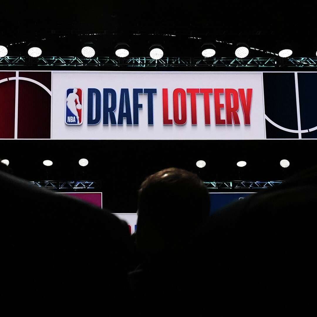 People attend the NBA basketball draft lottery in Chicago, Sunday, May 10, 2026.
