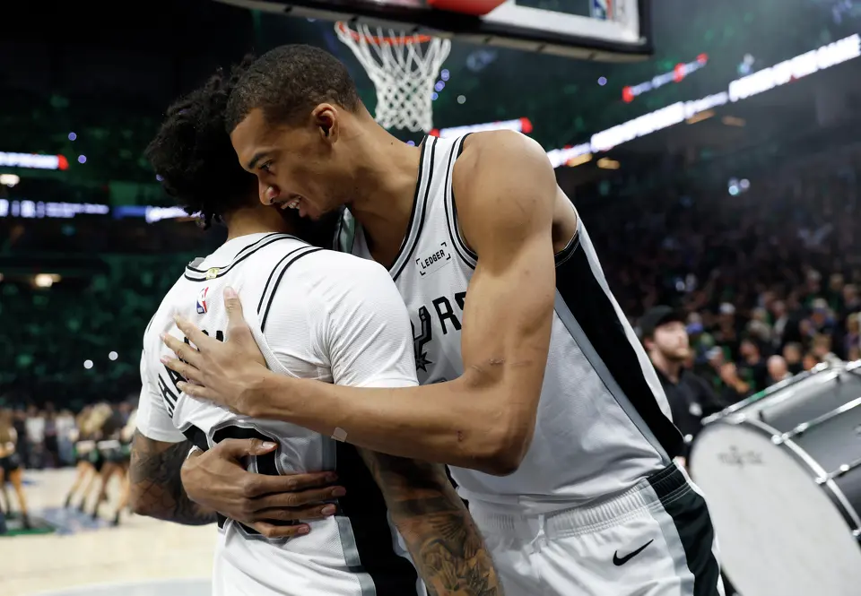 San Antonio Spurs forward Victor Wembanyama (1) talks with forward Julian Champagnie (30) before the start of game 4 against the Minnesota Timberwolves on Sunday, May 10, 2026.