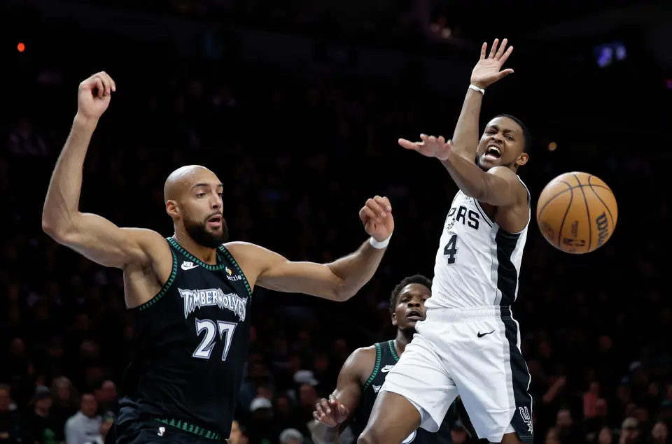 San Antonio Spurs guard De'Aaron Fox (4) has a shot blocked by Minnesota Timberwolves center Rudy Gobert (27) during the first half of Game 4 of the Western Conference semifinals at Target Center in Minneapolis on Sunday, May 10, 2026.
