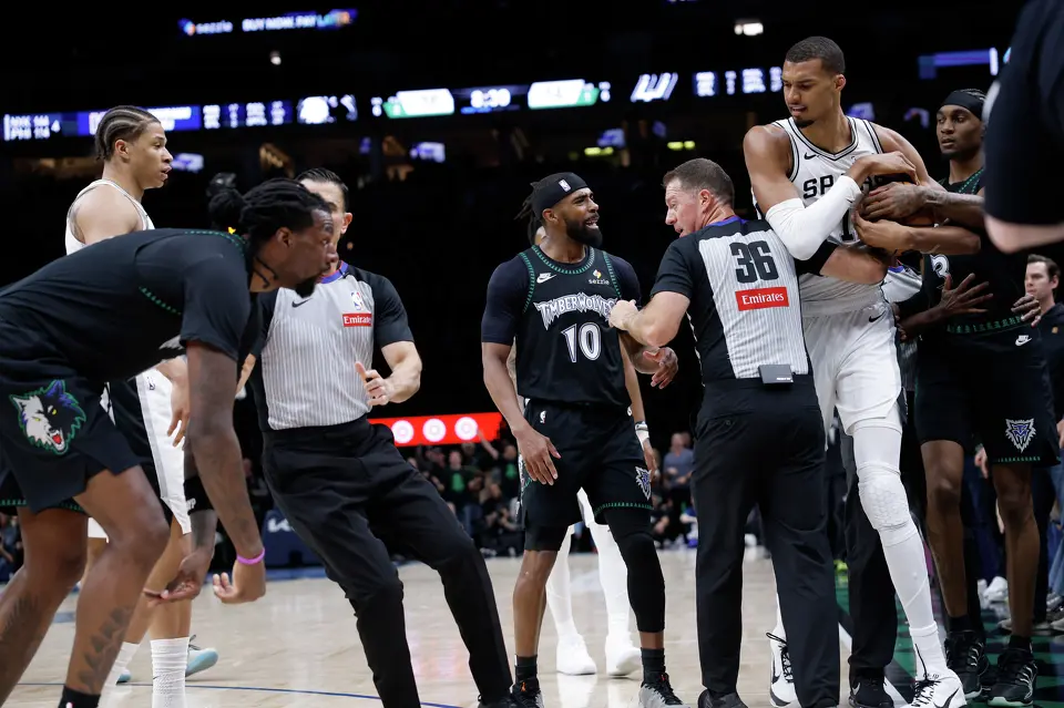 San Antonio Spurs forward Victor Wembanyama (1) draws a flagrant foul penalty as referees separate players in the 2nd quarter of Game 4.