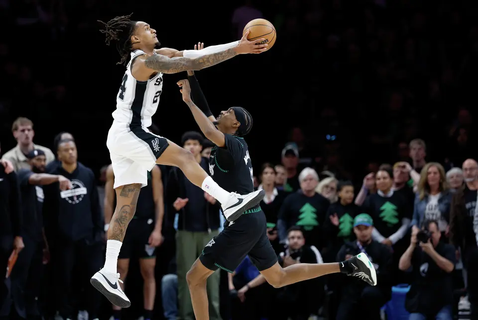 San Antonio Spurs guard Devin Vassell (24) grabs a pass over Minnesota Timberwolves forward Jaden McDaniels (3) in the closing seconds of the 4th quarter of Game 4 of the Western Conference semifinals at Target Center in Minneapolis on Sunday, May 10, 2026. The Spurs lost to the Timberwolves 114-109, tying the series at 2-2.