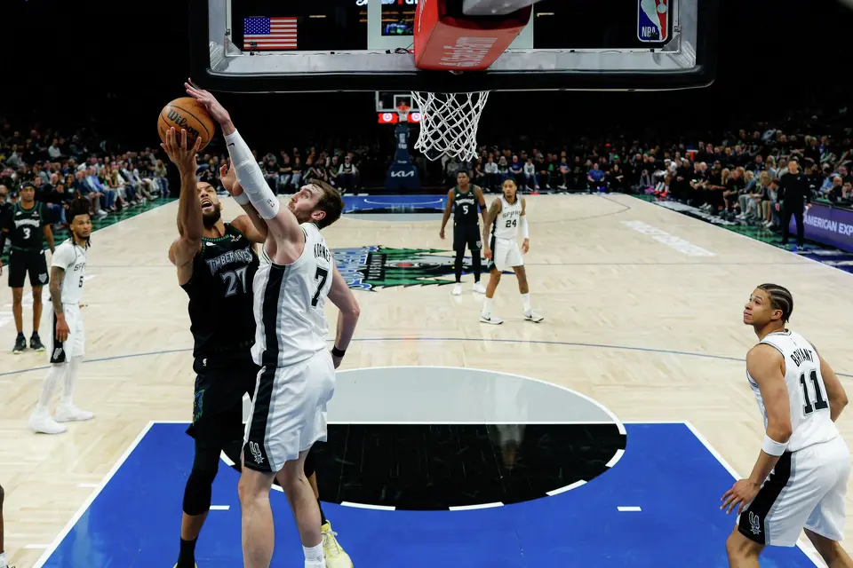 San Antonio Spurs center Luke Kornet (7) blocks Minnesota Timberwolves center Rudy Gobert (27) during the second quarter of Game 4 of the Western Conference semifinals at Target Center in Minneapolis on Sunday, May 10, 2026. The Spurs lost to the Timberwolves 114-109, tying the series at 2-2.