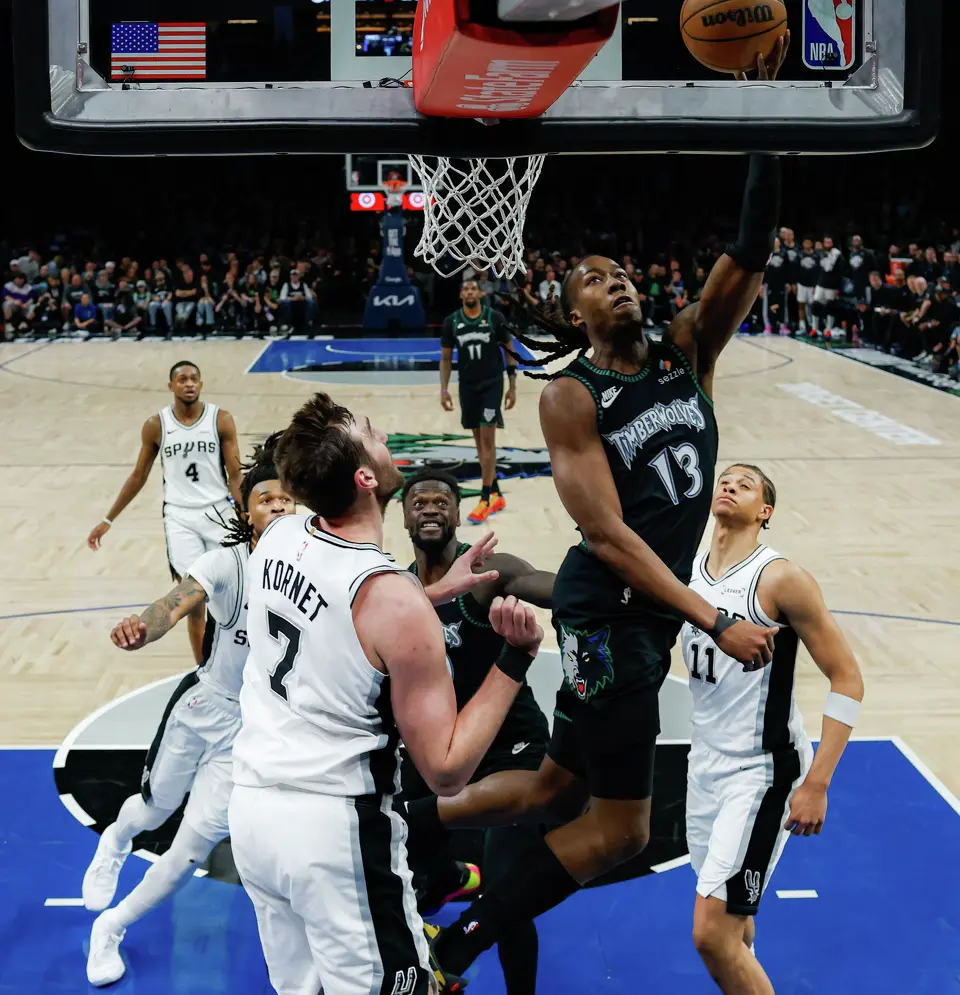 Minnesota Timberwolves guard Ayo Dosunmu (13) goes up for a shot during Game 4 of the Western Conference semifinals against the San Antonio Spurs at Target Center in Minneapolis on Sunday, May 10, 2026. The Spurs lost to the Timberwolves 114-109, tying the series at 2-2.