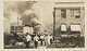 This photo provided by The University of Tulsa shows two armed men walking away from a billowing cloud of smoke during the Tulsa Race Massacre, June 1, 1921, in Tulsa, Okla. (The University of Tulsa McFarlin Library/Department of Special Collections and University Archives via AP)