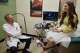 Dr. John Gordon talks with patient Maggie Lichfield after an ultrasound at Rejoice Fertility, Jan. 9, 2026, in Knoxville, Tenn.