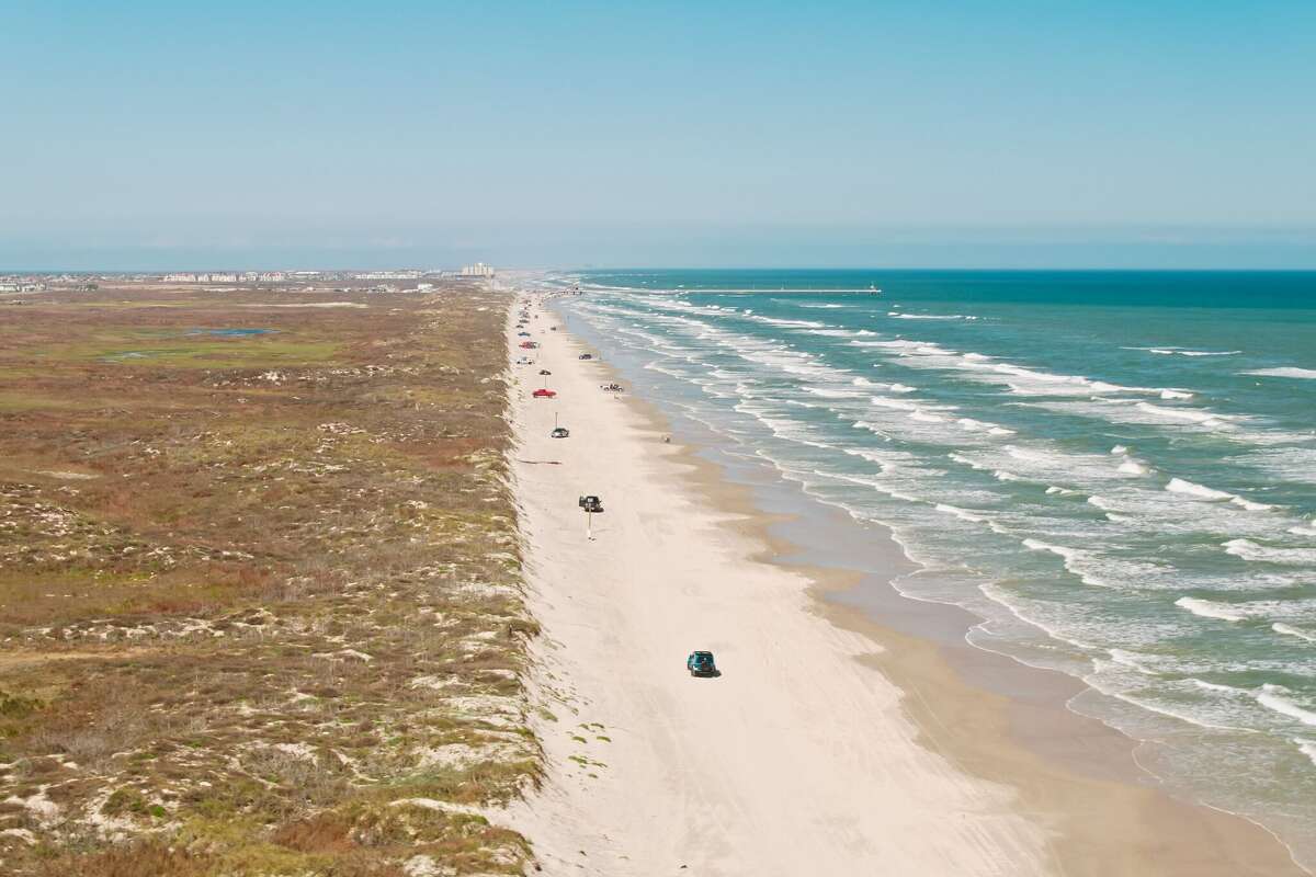 Visitors explore Padre Island National Seashore, one of several Texas National Park Service sites that could see hunting restrictions loosened under a new Trump administration directive. 