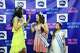 Miss Asia America International Selina Rushel (left) shares a laugh with Miss Teen Asia America International Jana Aguilar (center) as Miss Asia America Little Princess Kaylee Charion follows during a meet and greet, on Saturday, May 9, 2026 in Garland.