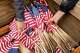 Flags are taken out to decorate graves ahead of Memorial Day at Golden Gate National Cemetery in San Bruno in 2024.