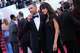 James Franco, left, and Izabel Pakzad pose for photographers at the opening ceremony and premiere of the film 'The Electric Kiss' during 79th international film festival, Cannes, southern France, Tuesday, May 12, 2026. (Photo by Scott A Garfitt/Invision/AP)