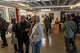 Guests admire artwork at the American Messenger art gallery in San Francisco on Thursday, May 7, 2026.