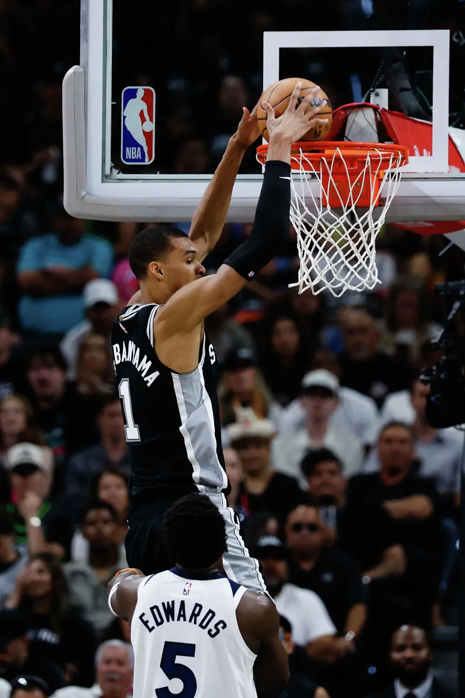 San Antonio Spurs forward Victor Wembanyama (1) dunks the ball during the first half of Game 5 of the Western Conference semifinals at Frost Bank Center in San Antonio, Tuesday, May 12, 2026.