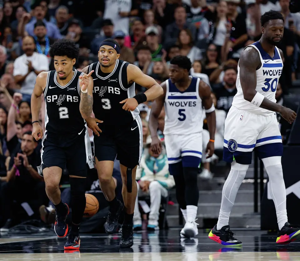 San Antonio Spurs guard Dylan Harper (2) and forward Keldon Johnson (3) take on the Minnesota Timberwolves during the first half of Game 5 of the Western Conference semifinals at Frost Bank Center in San Antonio, Tuesday, May 12, 2026.