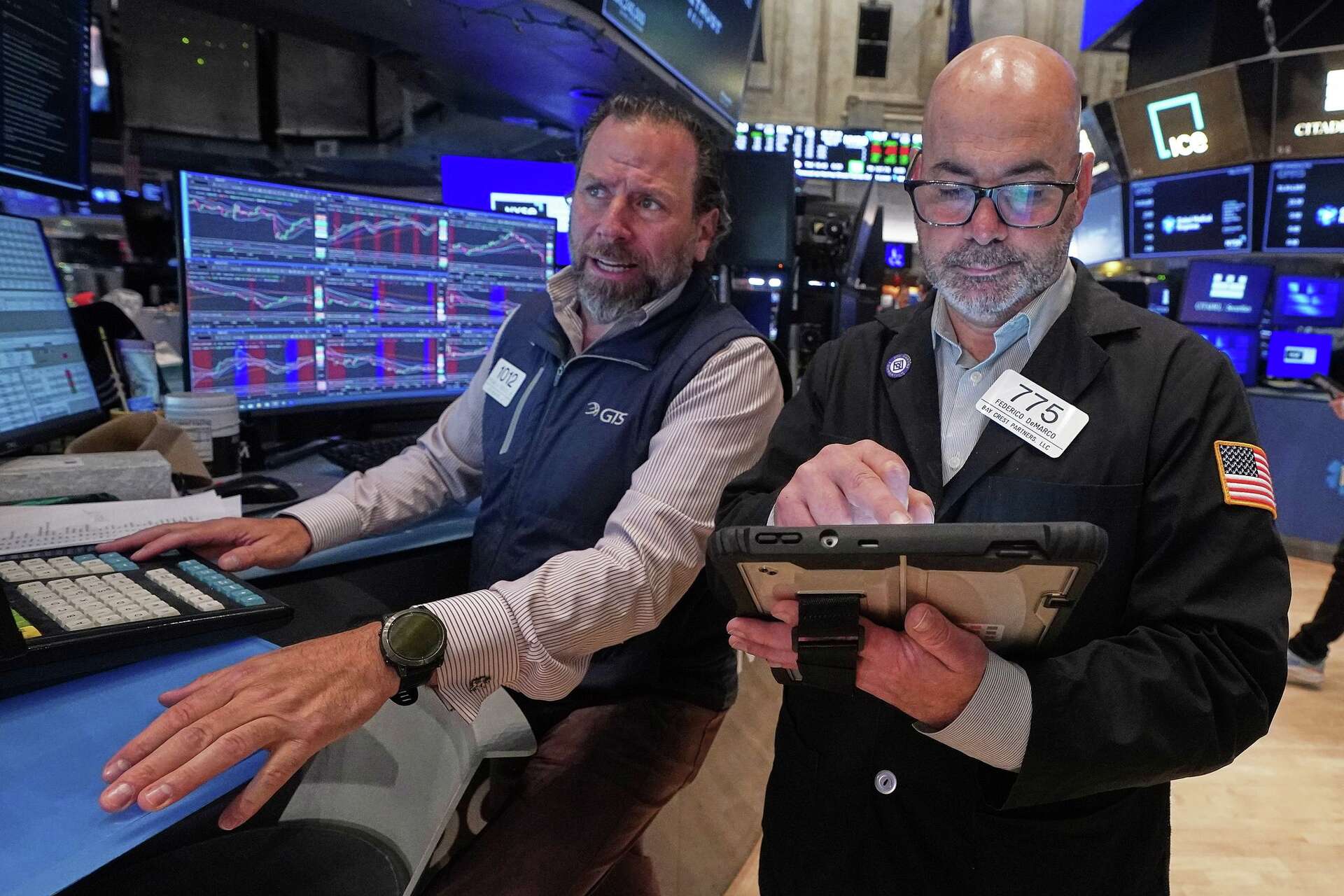 Tech carries Wall Street to records, even as most stocks fall