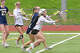 Masuk?s Charlotte Pinto (1) scores a goal while being defended by Simsbury?s Ellie Kirk (17) during their game Saturday, April 24, 2026 at Masuk High School.