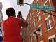 Former Dallas police officer Amber Guyger granted parole 5 Allison Jean takes a photo of the Botham Jean Boulevard sign in 2021. Botham Jean lived on this part of the street formerly known as South Lamar Street. (Juan Figueroa/The Dallas Morning News)